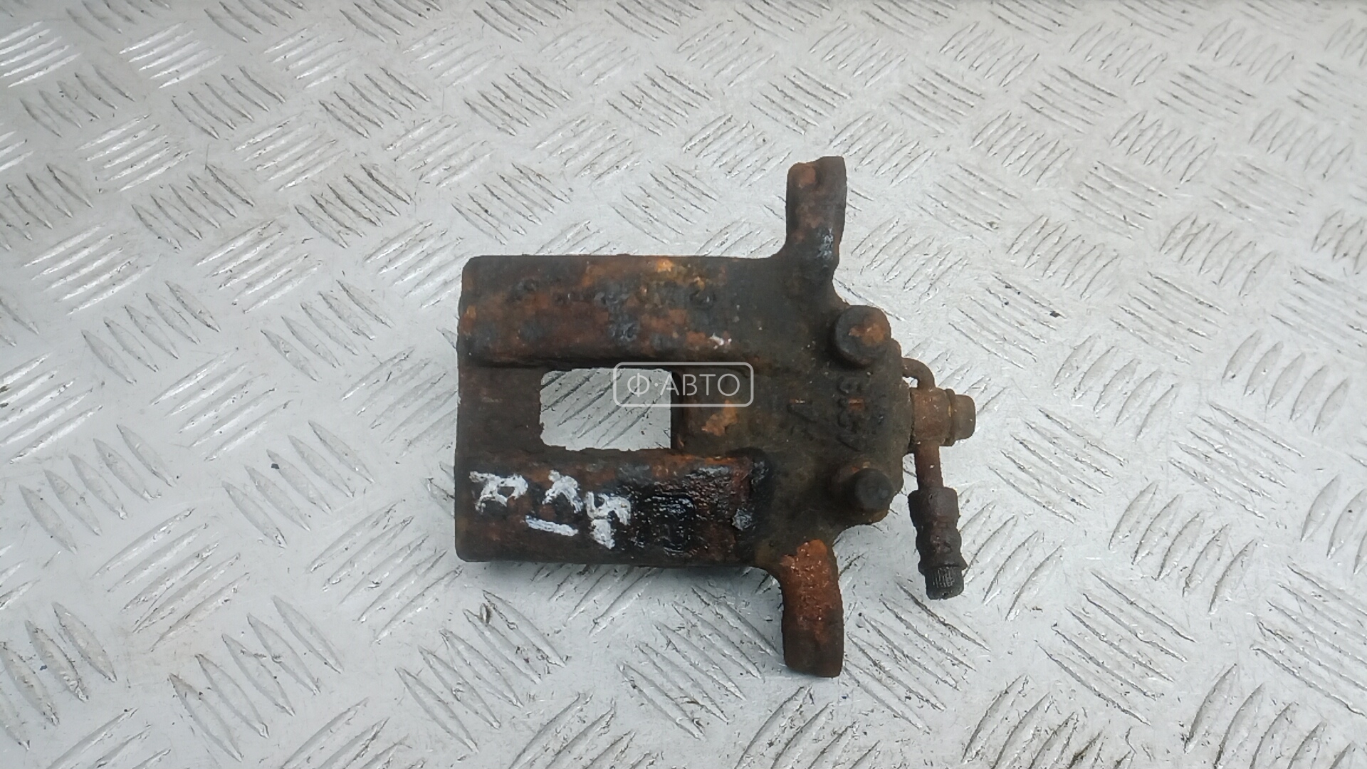 Суппорт тормозной задний левый