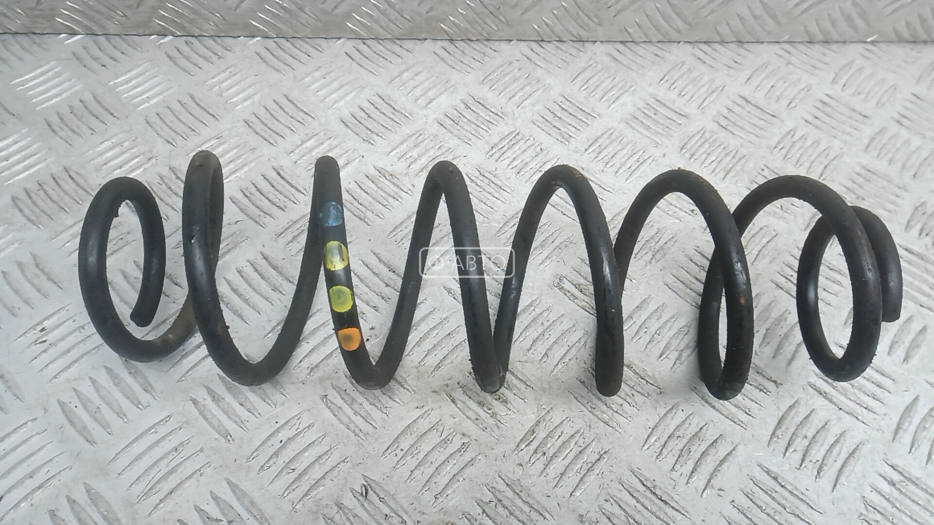 Пружина задняя