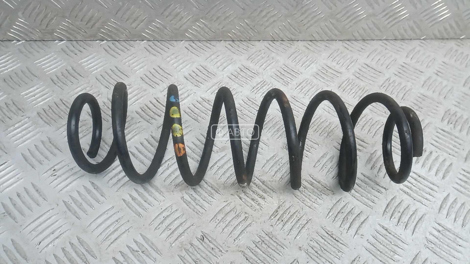 Пружина задняя