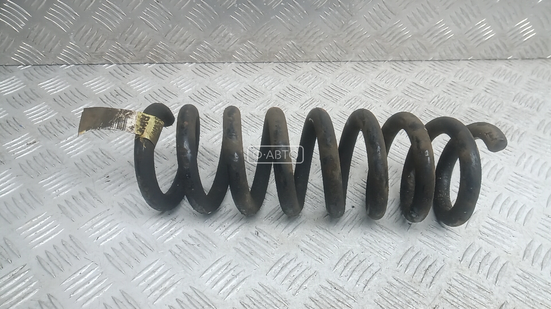 Пружина задняя