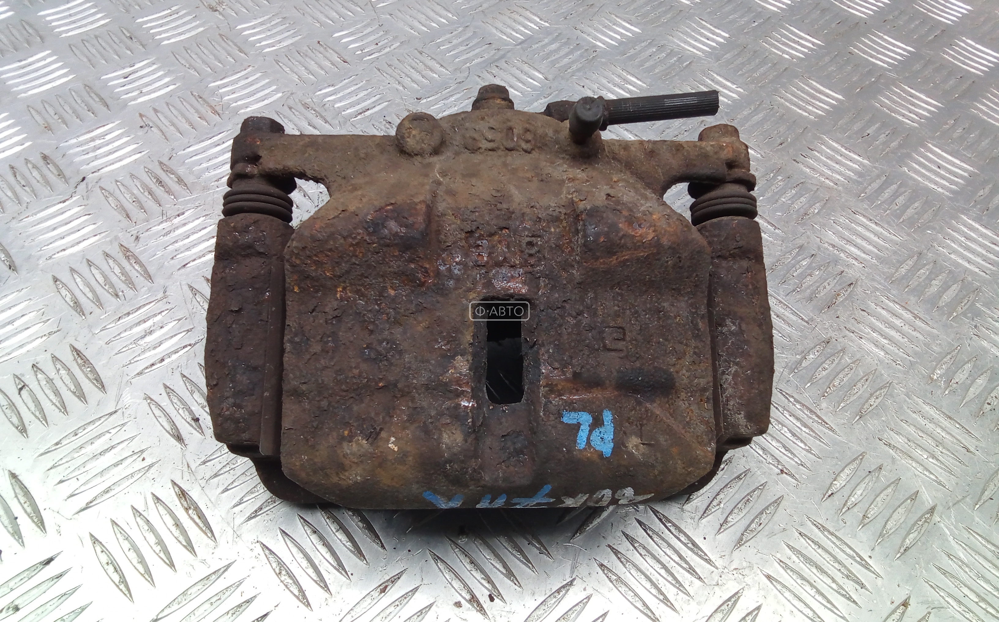 Суппорт тормозной передний левый