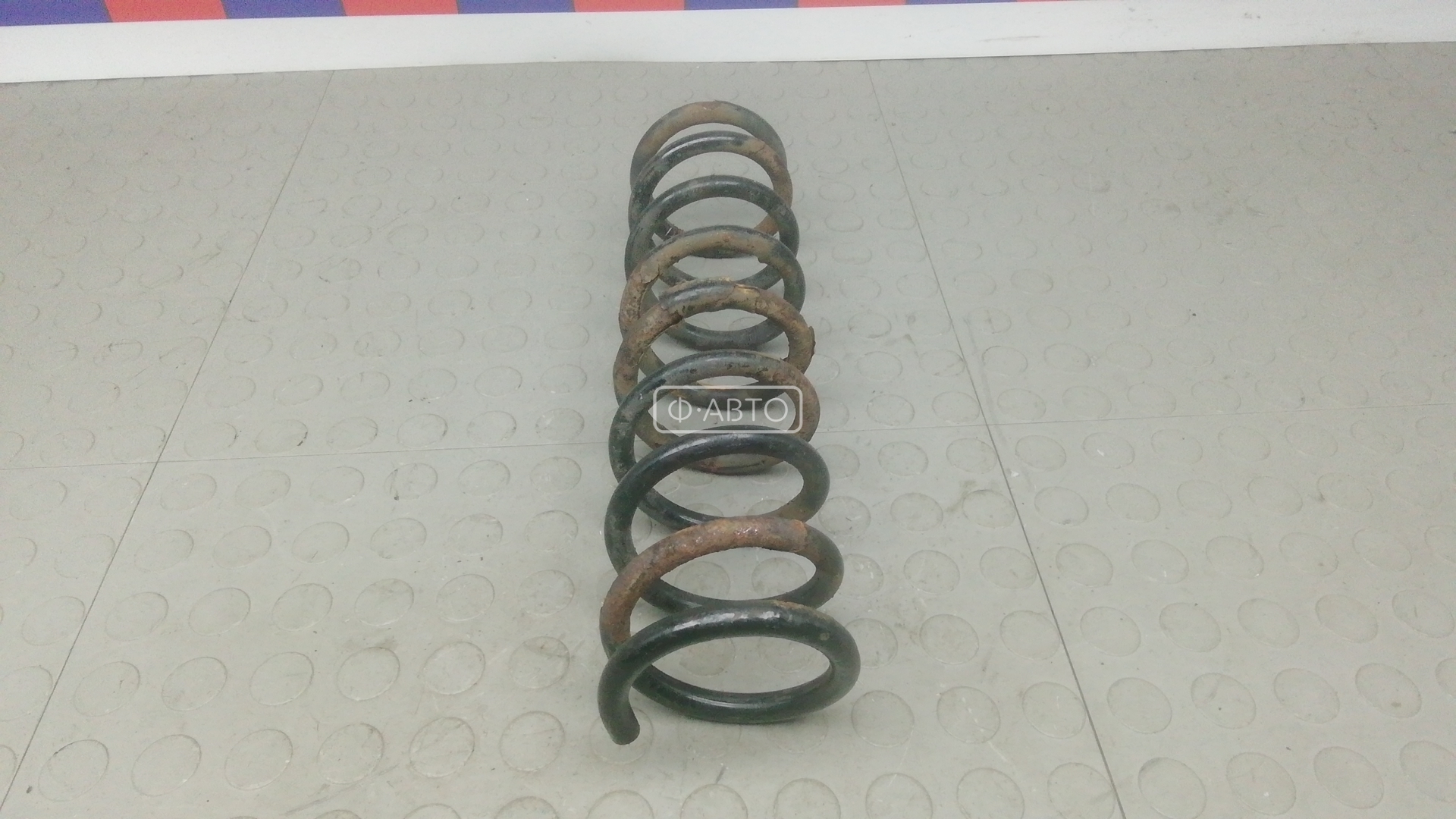 Пружина задняя