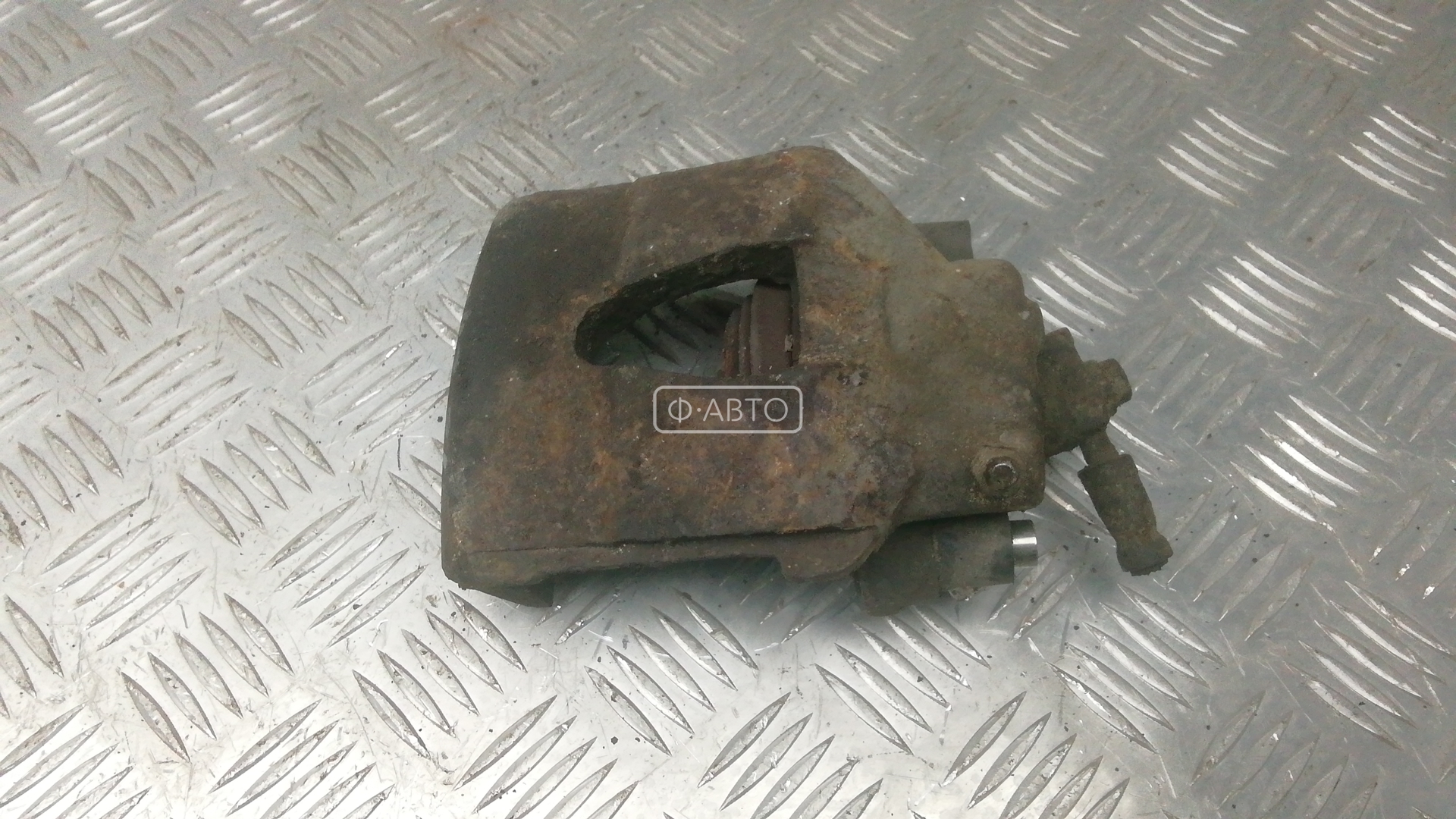 Суппорт тормозной передний левый