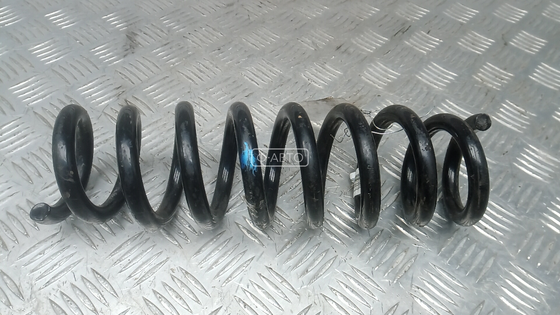 Пружина задняя