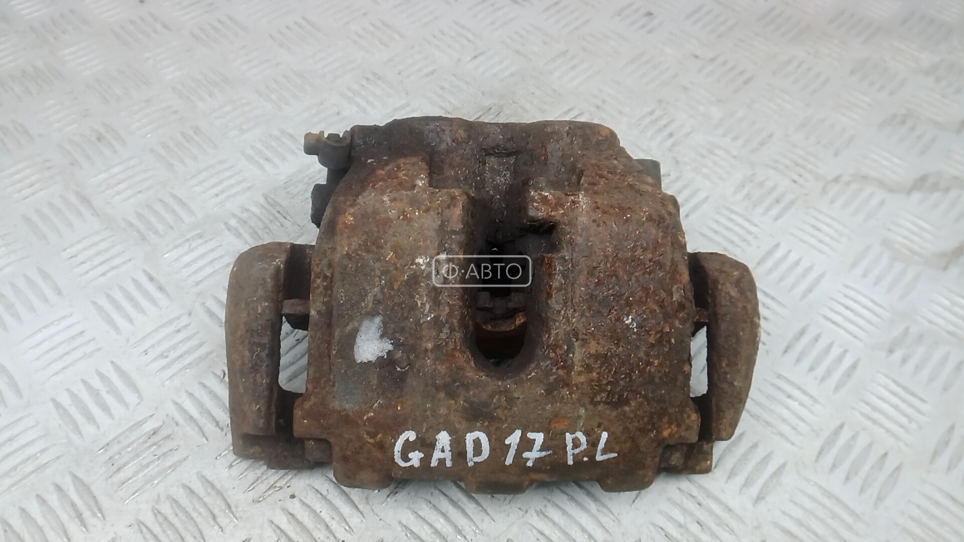 Суппорт тормозной передний левый