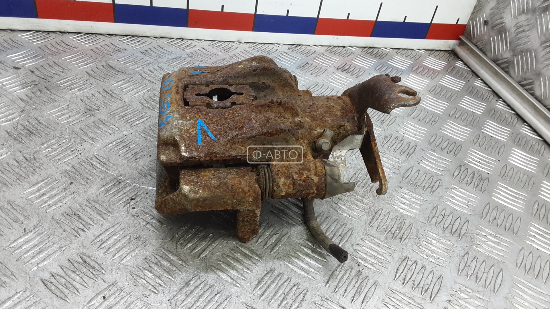 Суппорт тормозной задний левый