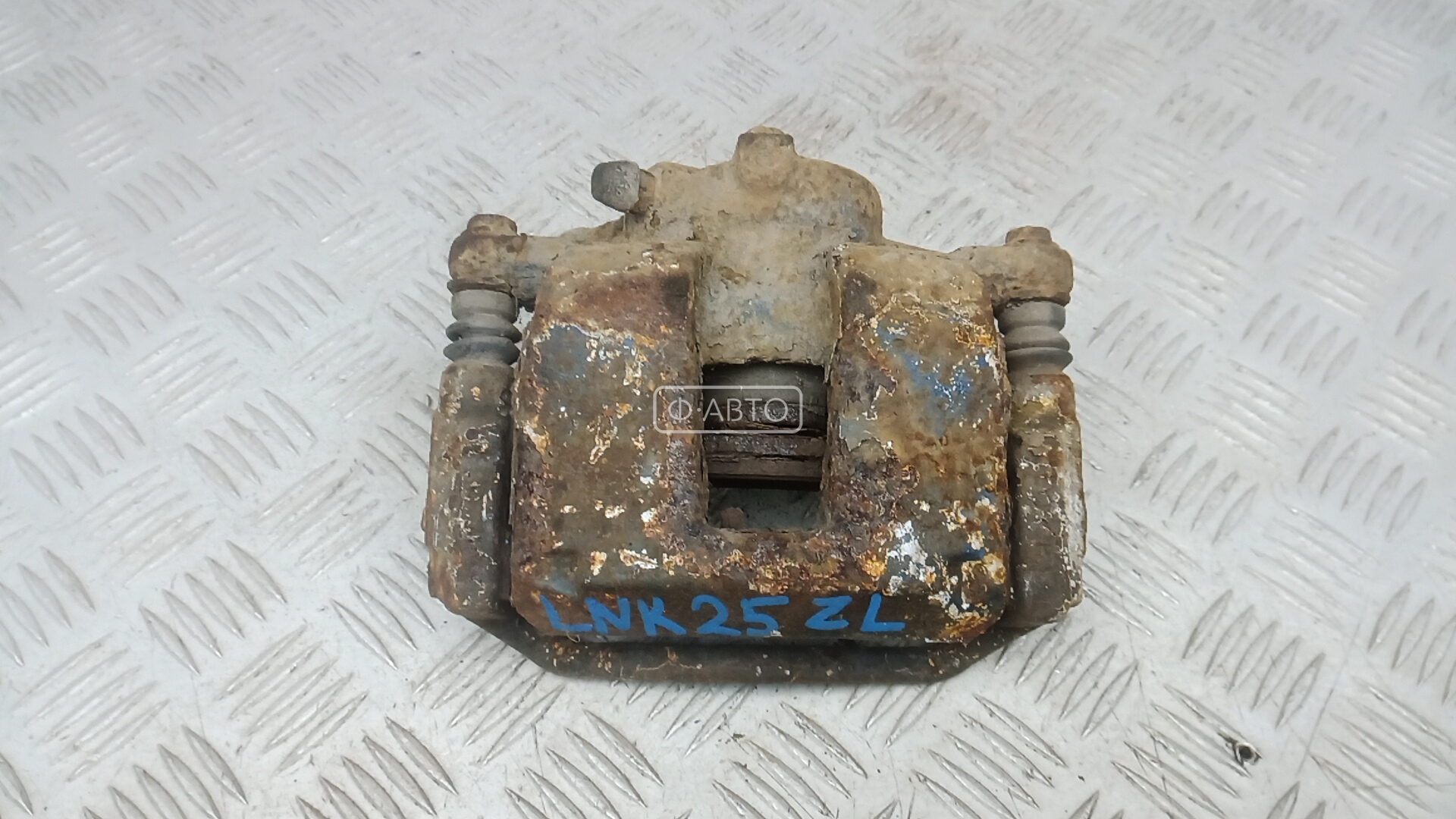 Суппорт тормозной задний левый