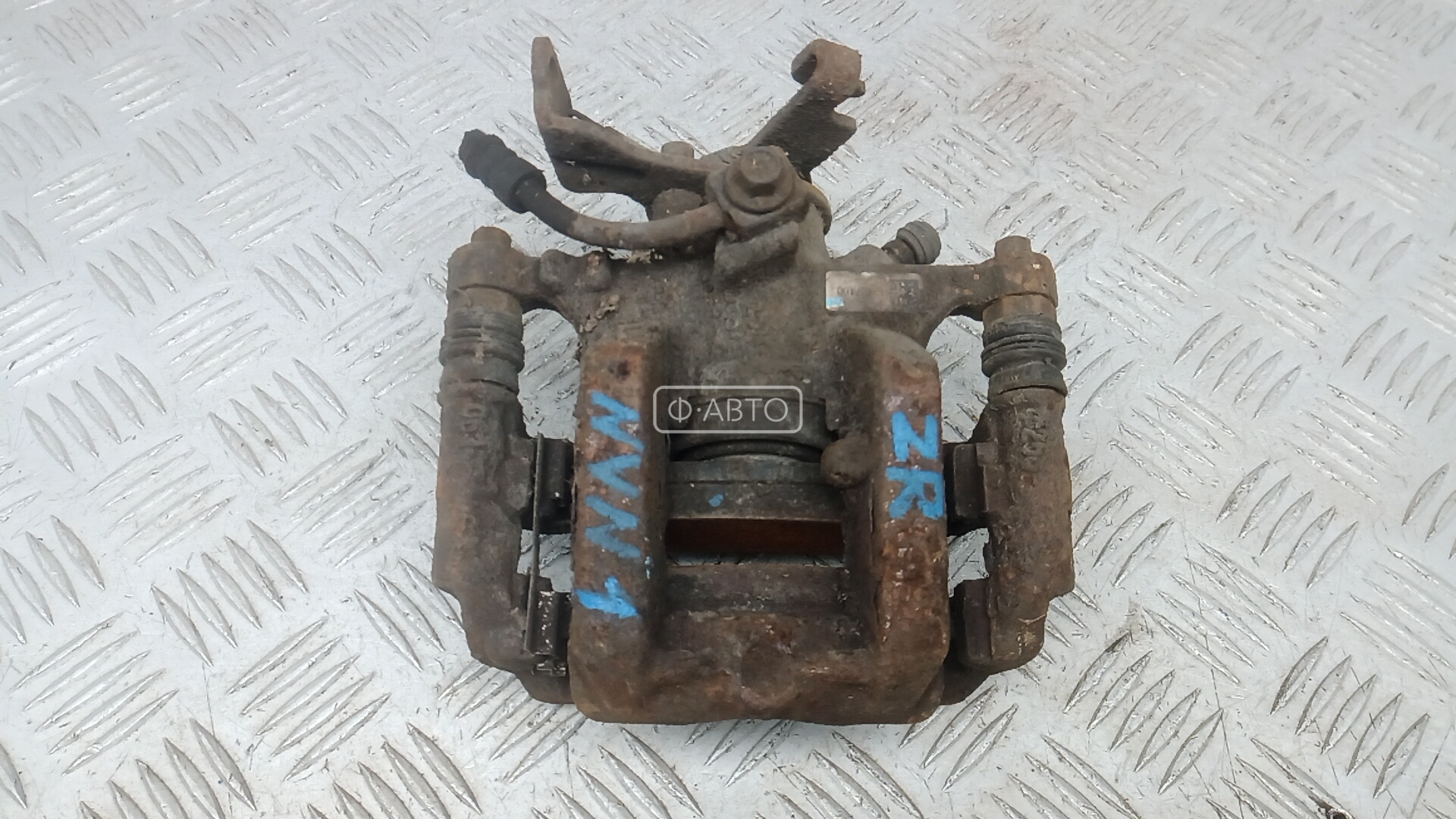 Суппорт тормозной задний правый