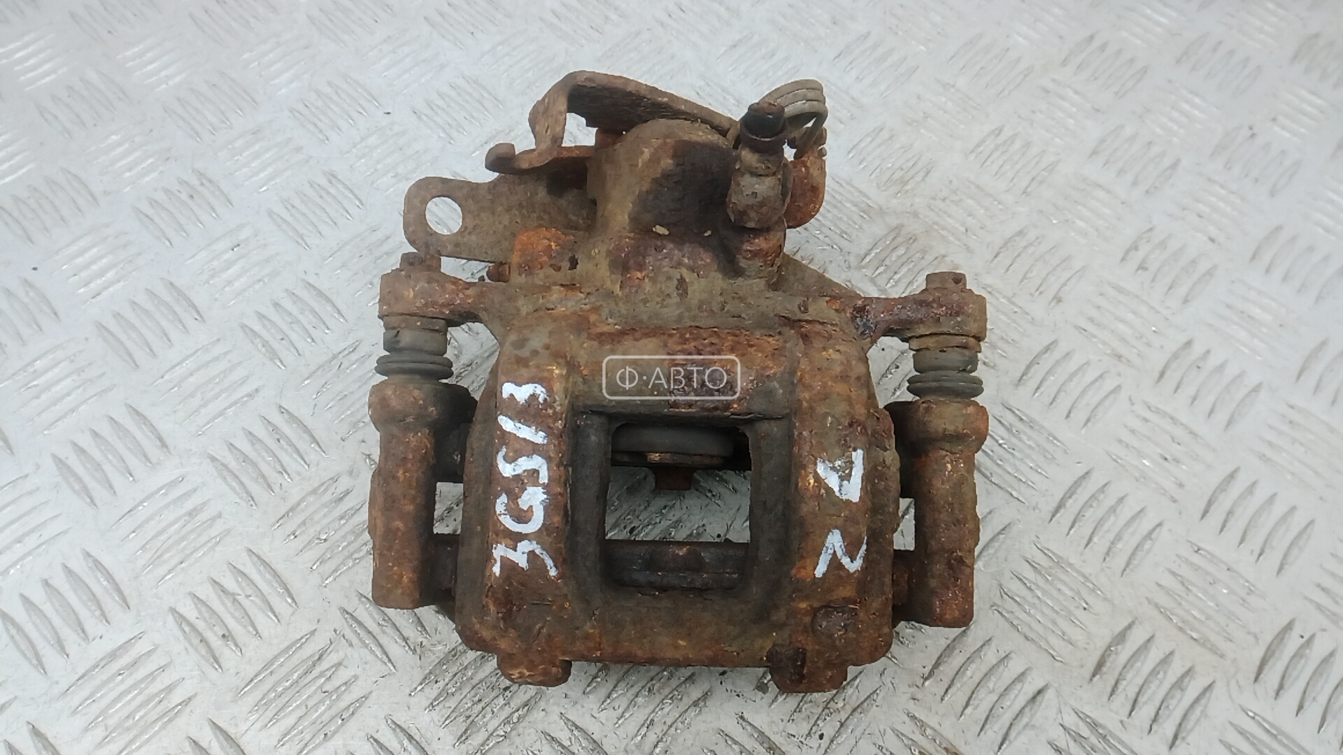 Суппорт тормозной задний левый