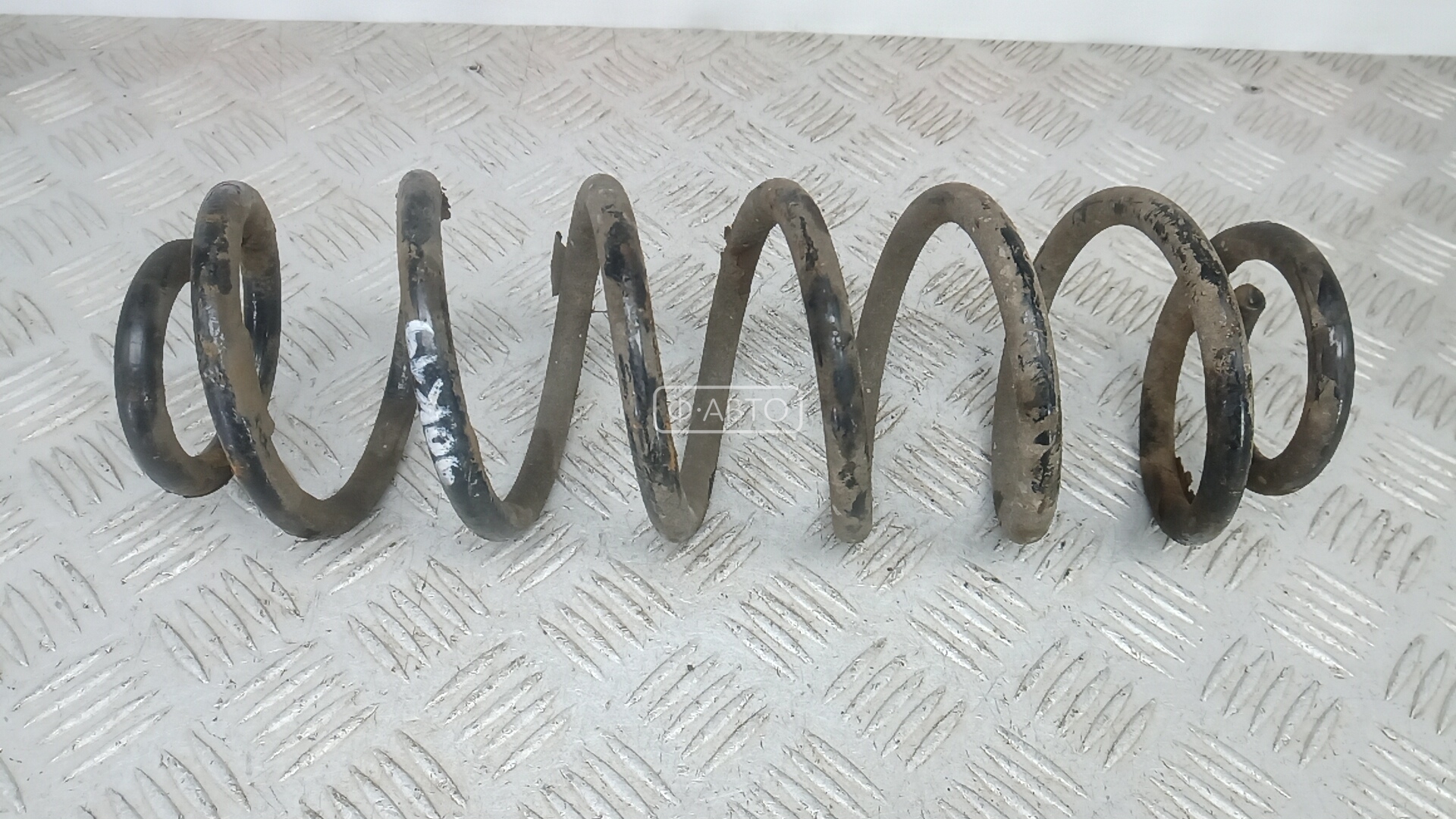 Пружина задняя