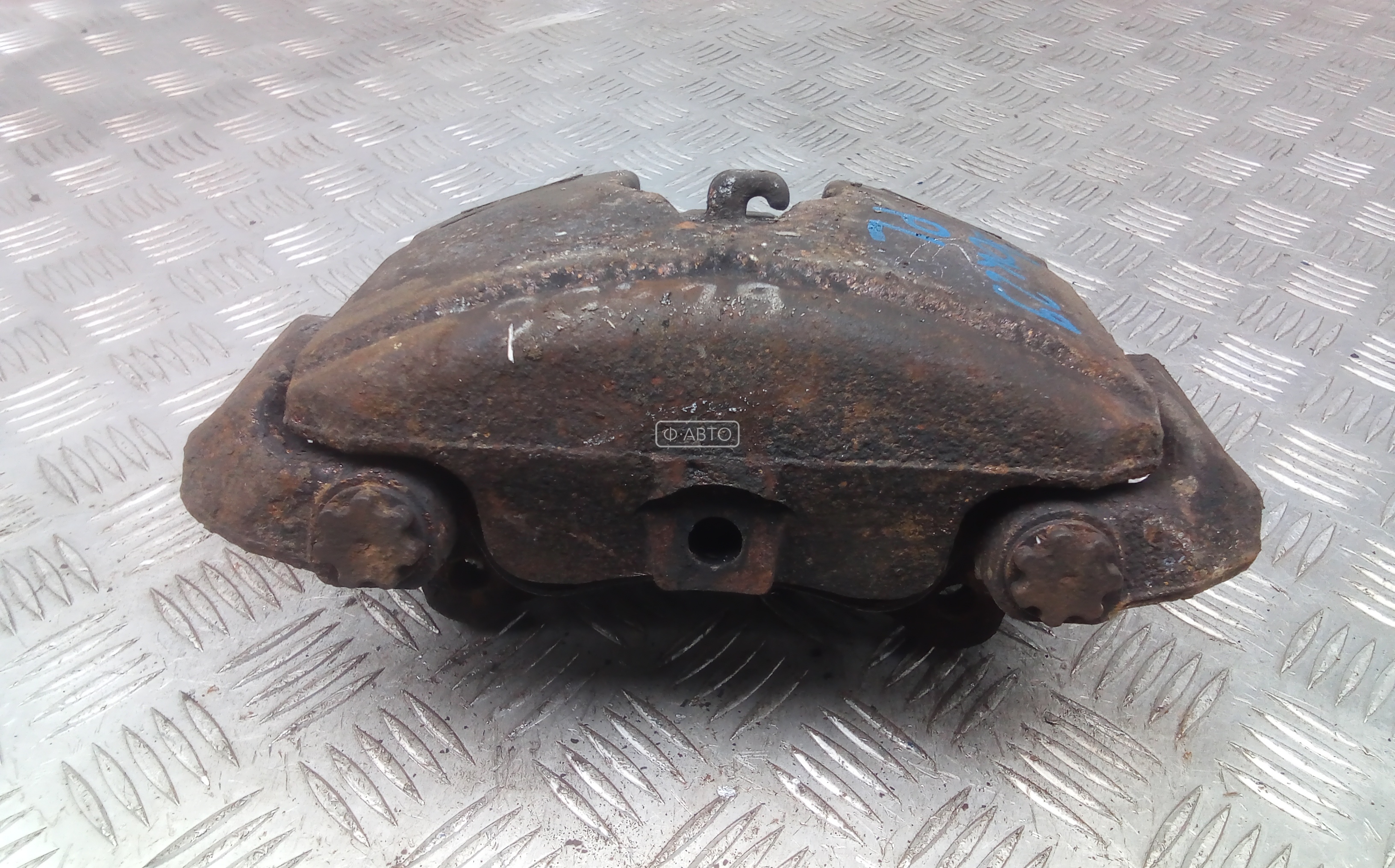Суппорт тормозной передний левый