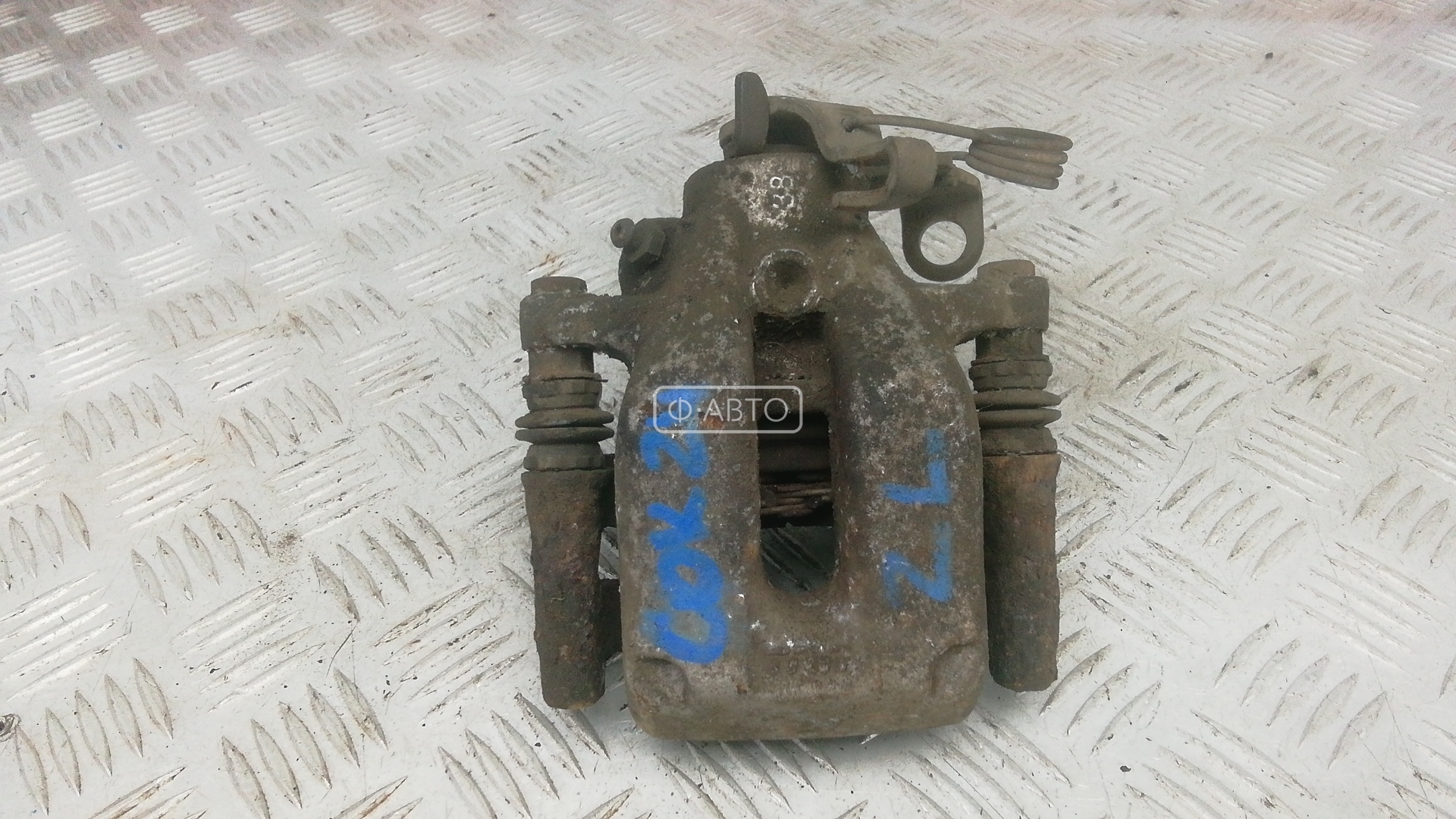 Суппорт тормозной задний левый