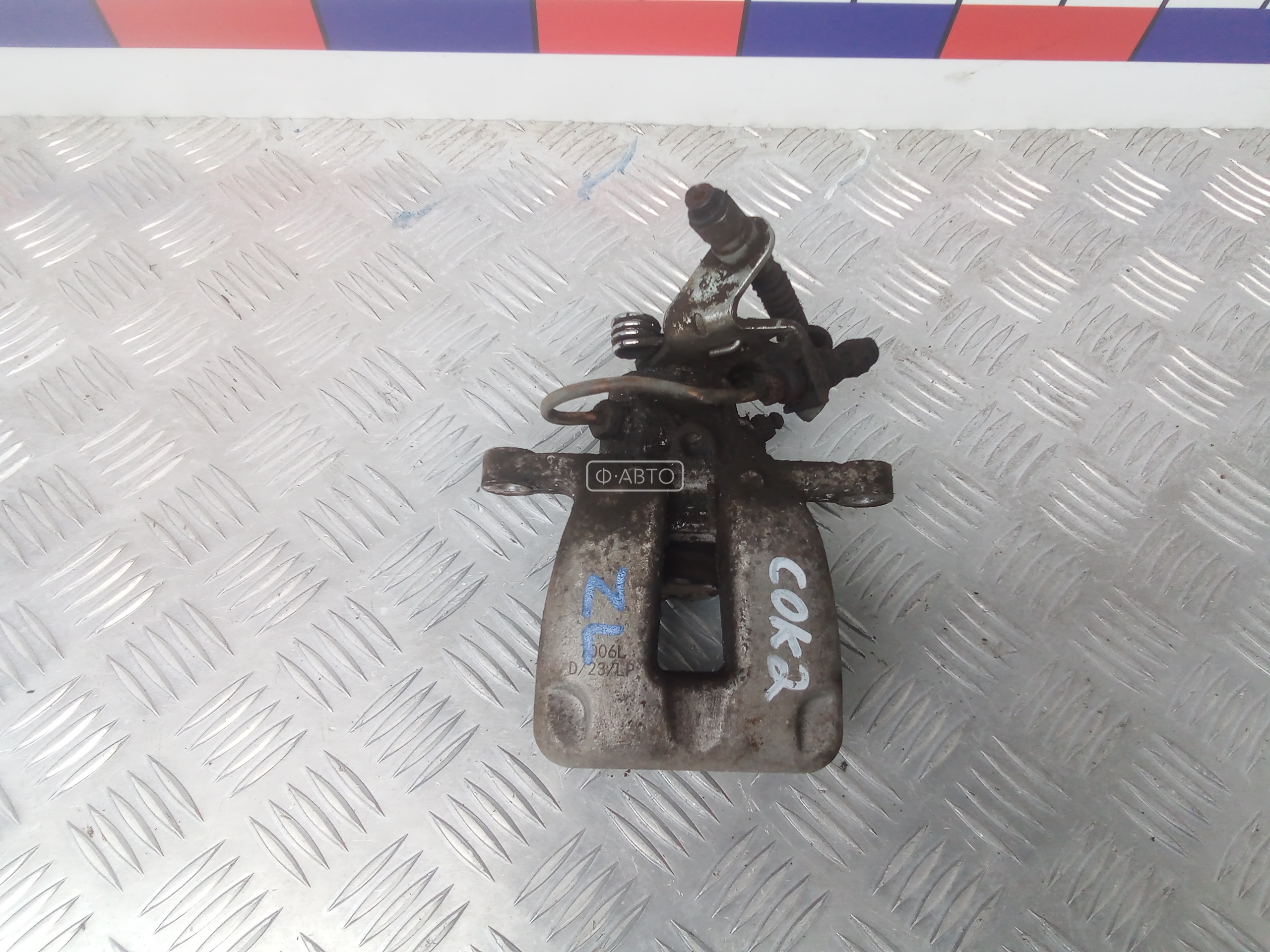 Суппорт тормозной задний левый