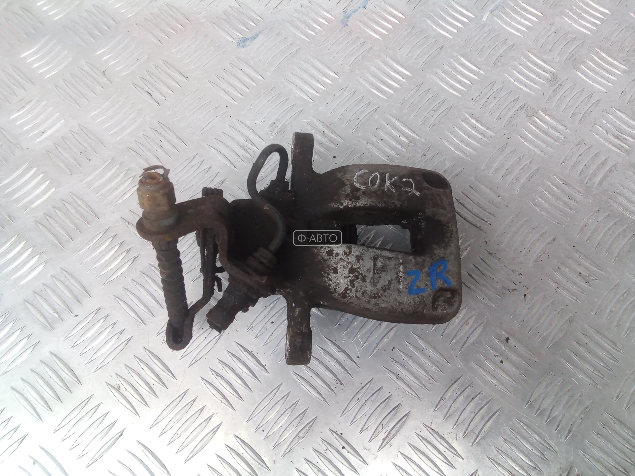 Суппорт тормозной задний правый