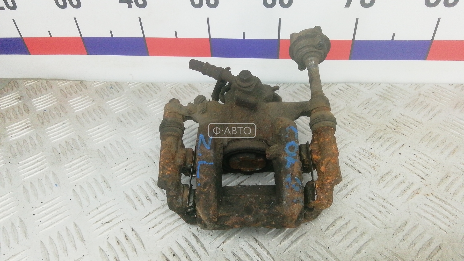 Суппорт тормозной задний левый