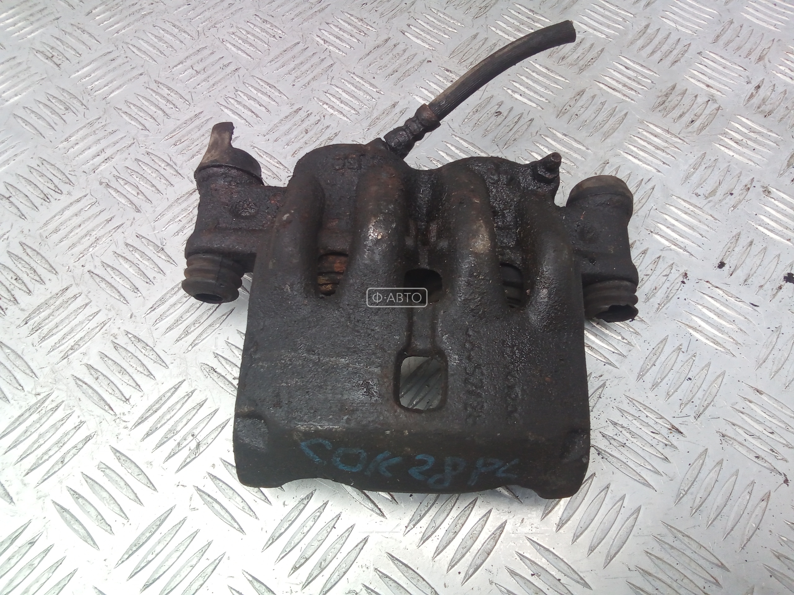 Суппорт тормозной передний левый