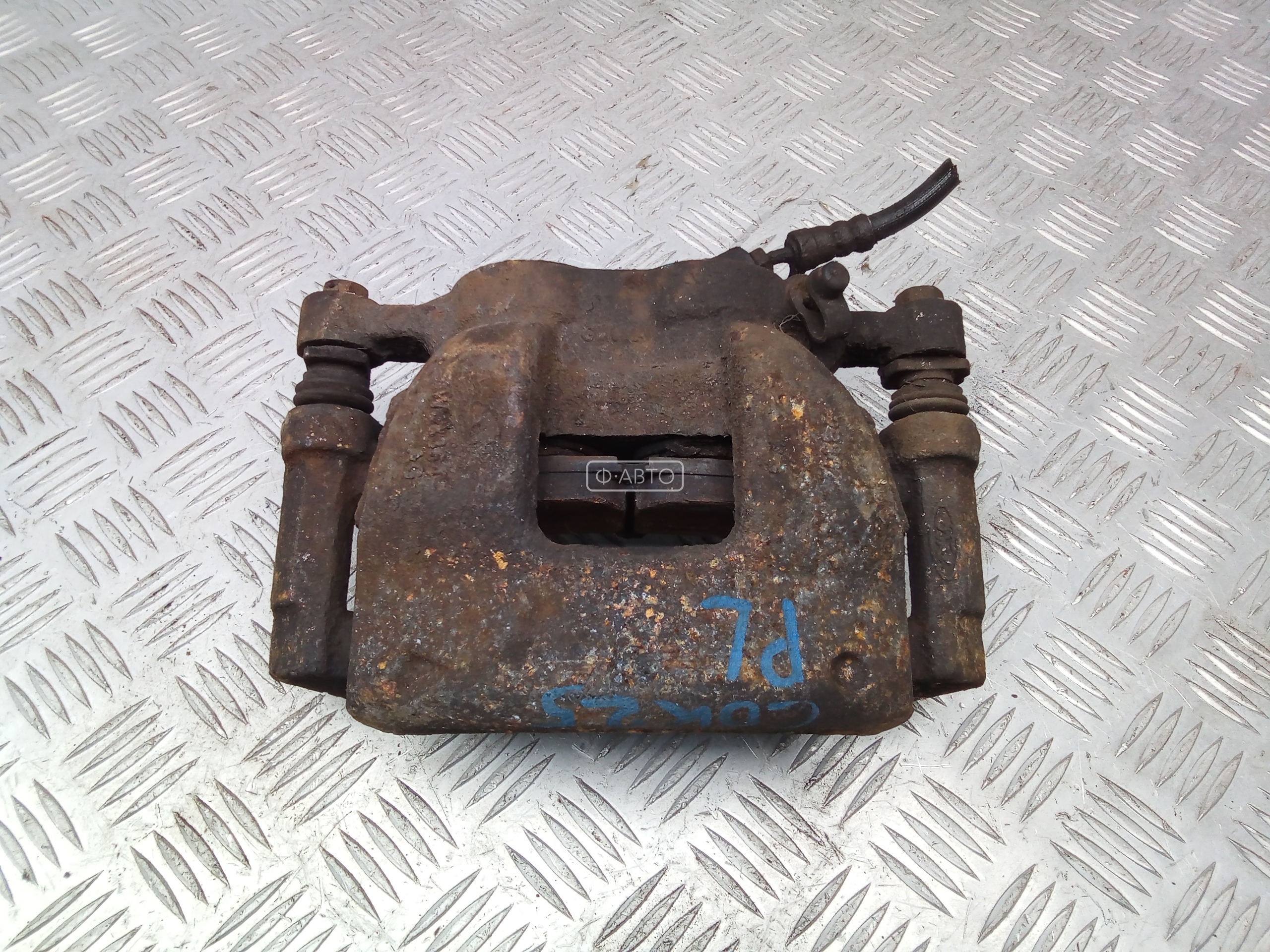 Суппорт тормозной передний левый