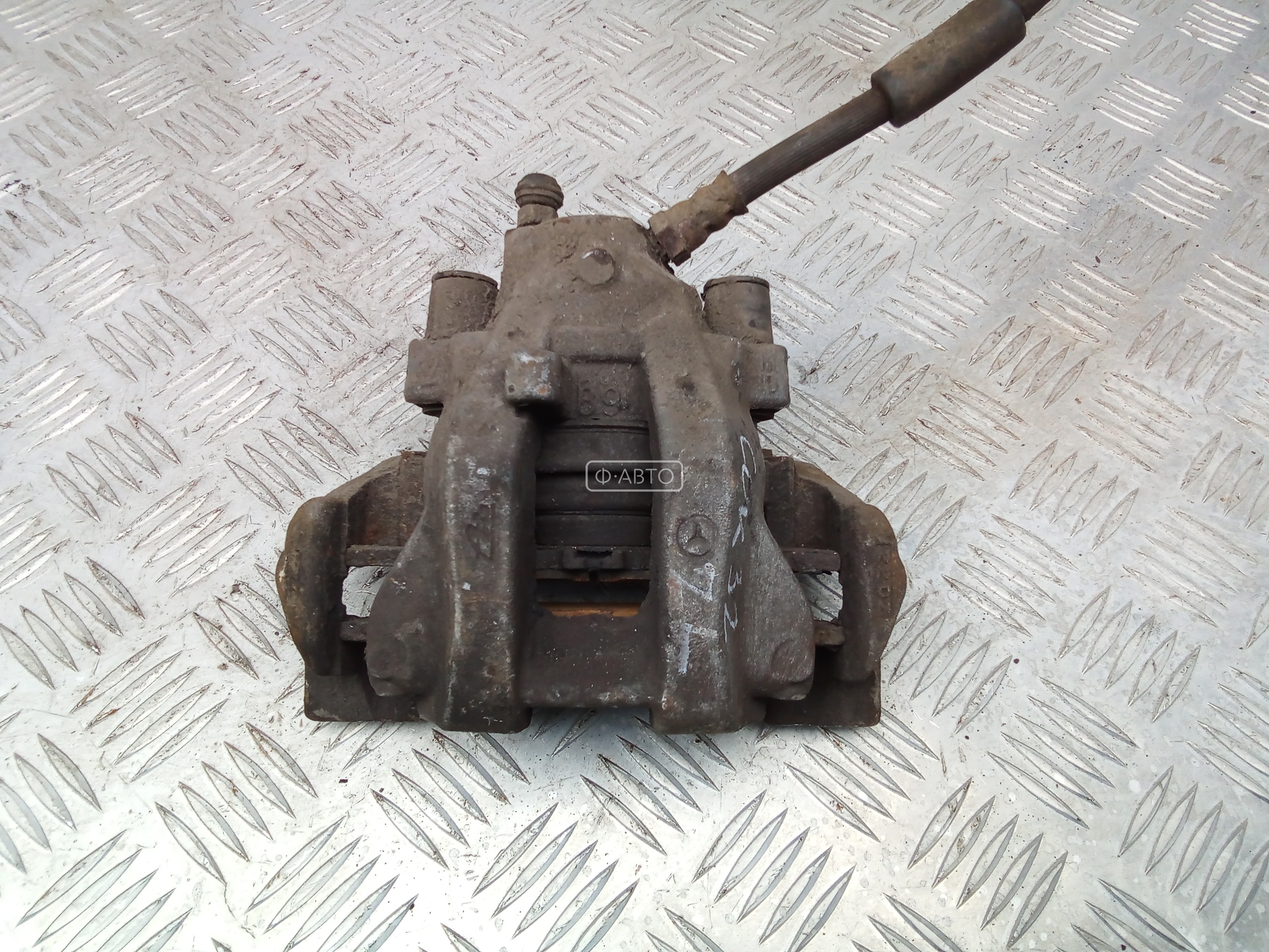 Суппорт тормозной задний левый