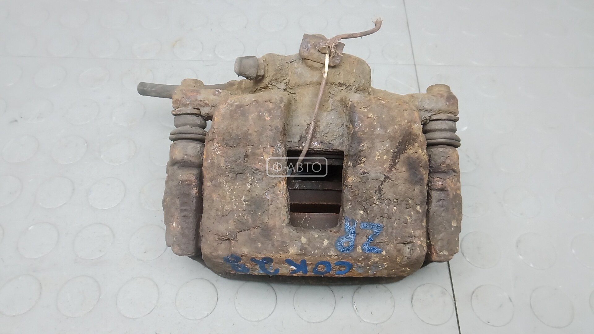 Суппорт тормозной задний правый