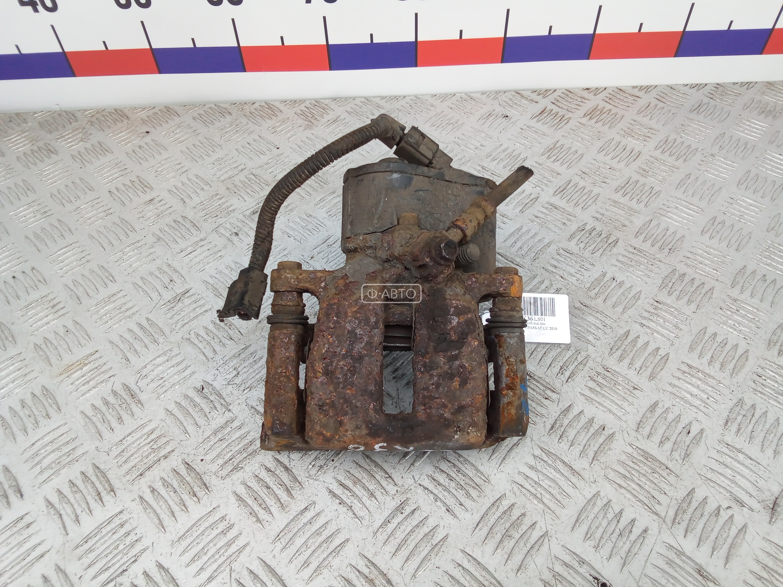 Суппорт тормозной задний левый