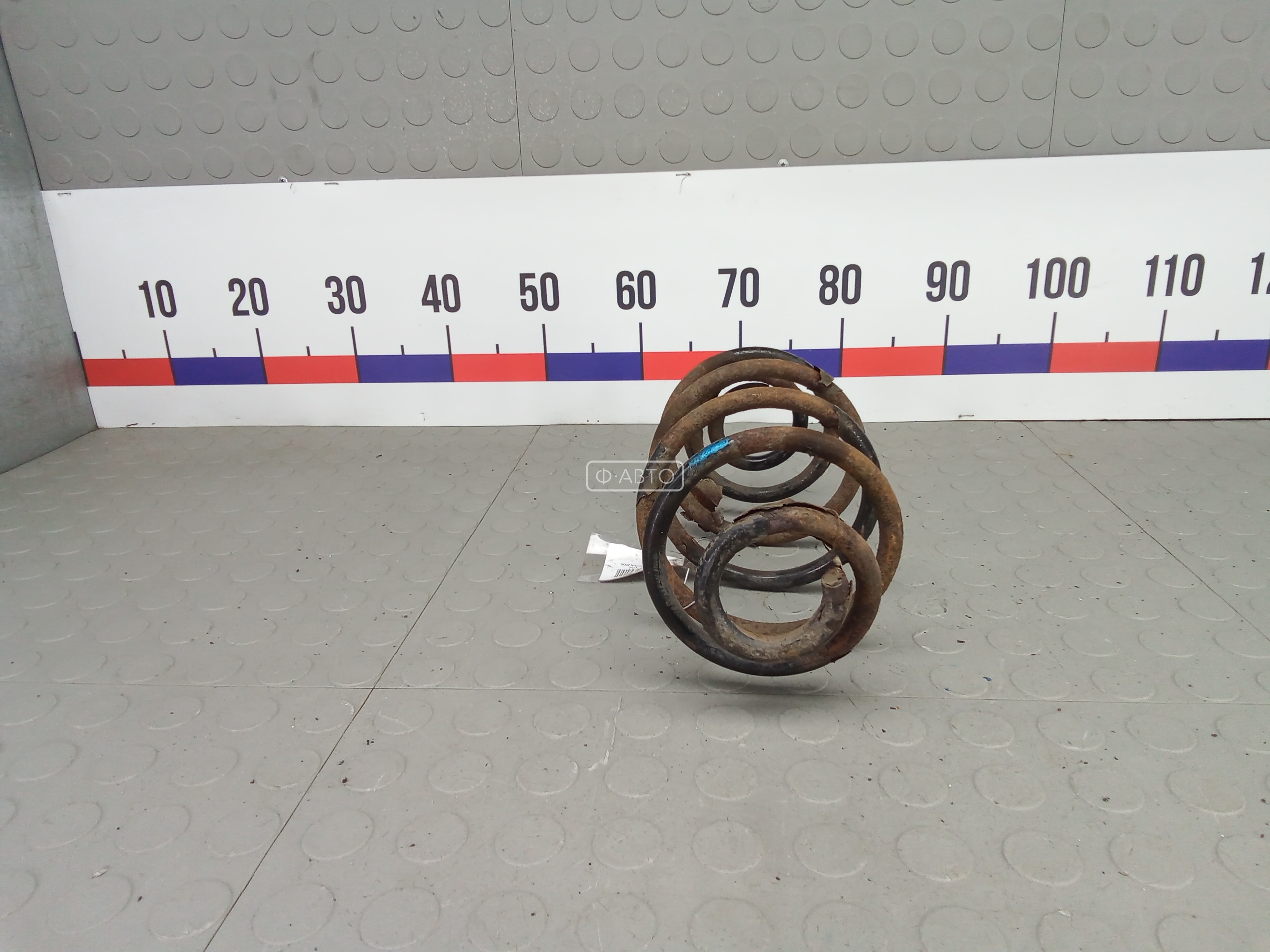 Пружина задняя