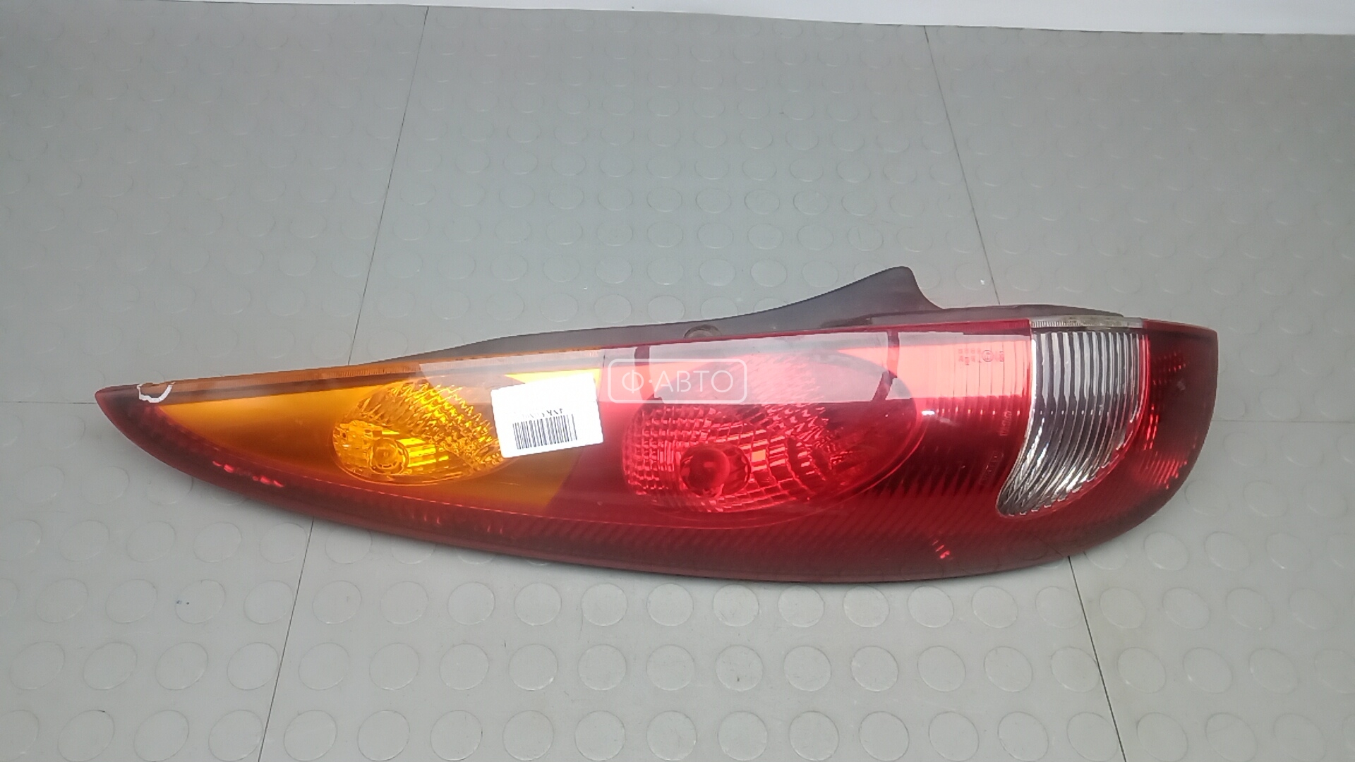 Фонарь задний левый NISSAN ALMERA TINO