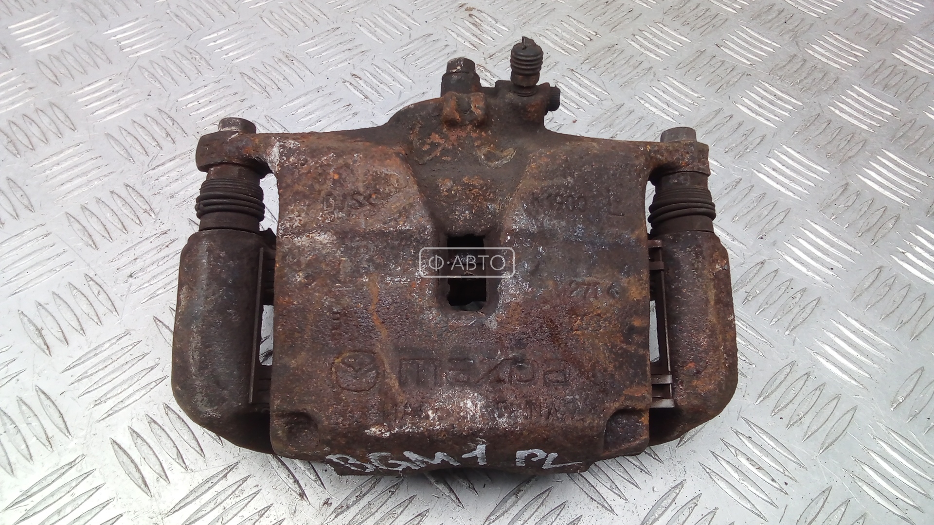Суппорт тормозной передний левый