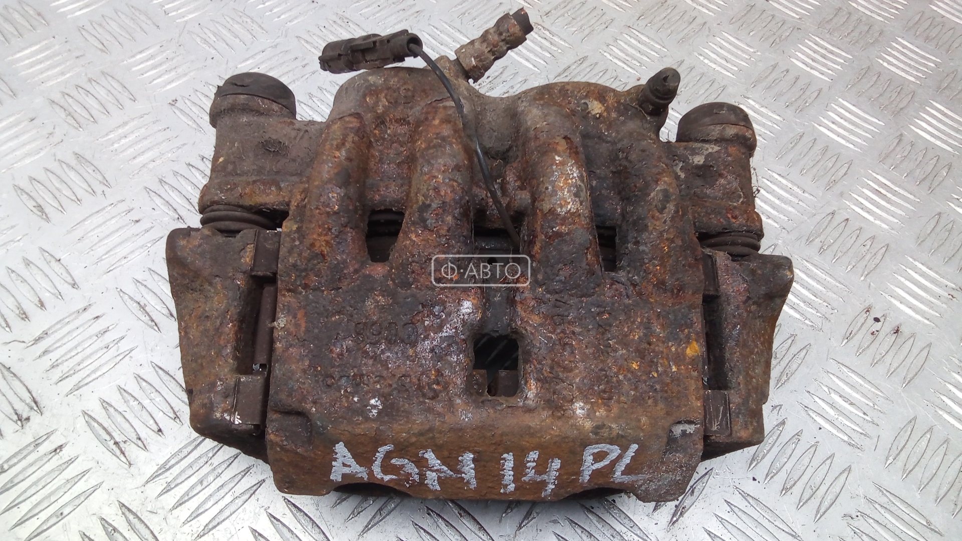 Суппорт тормозной передний левый