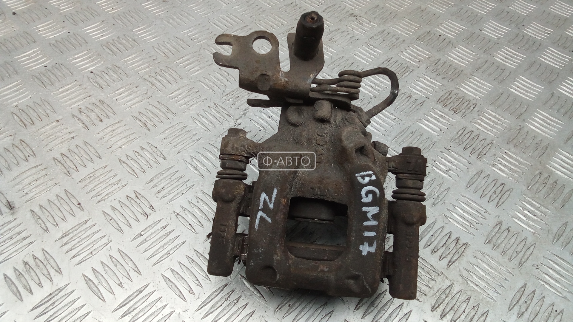 Суппорт тормозной задний левый