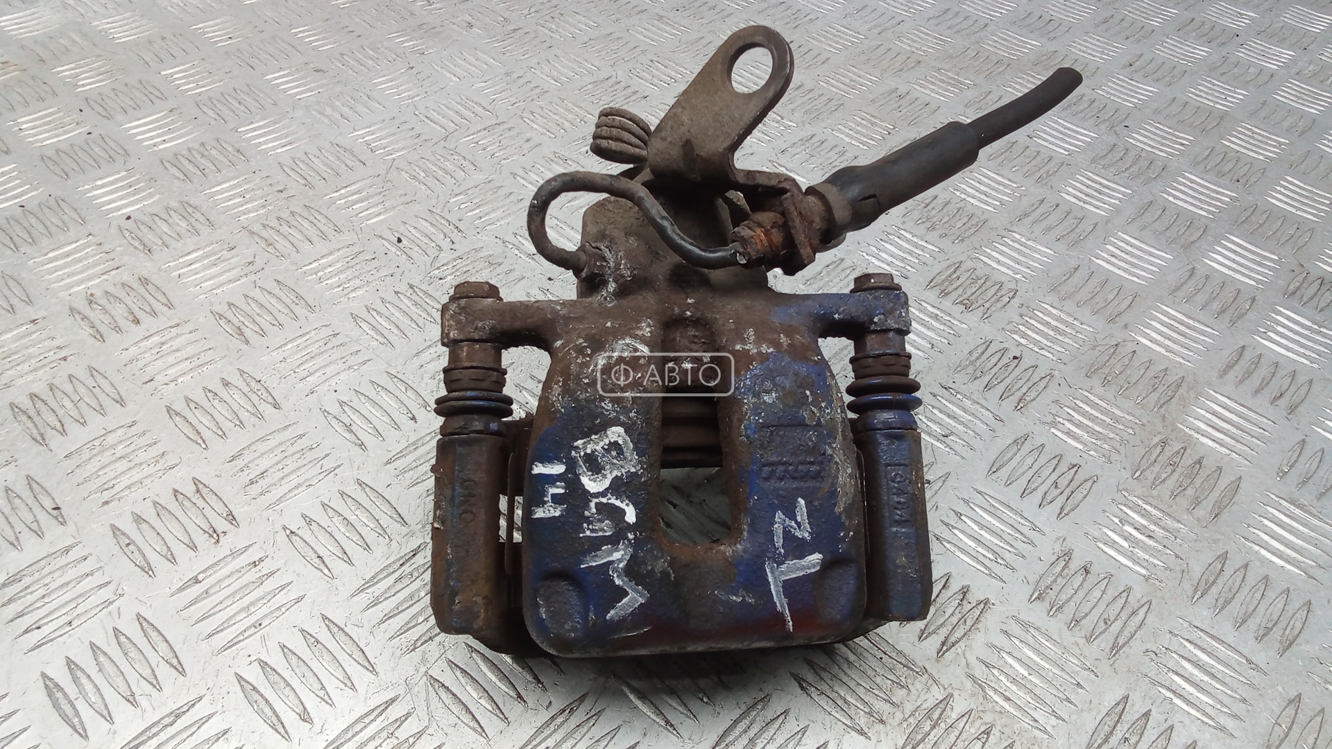 Суппорт тормозной задний левый