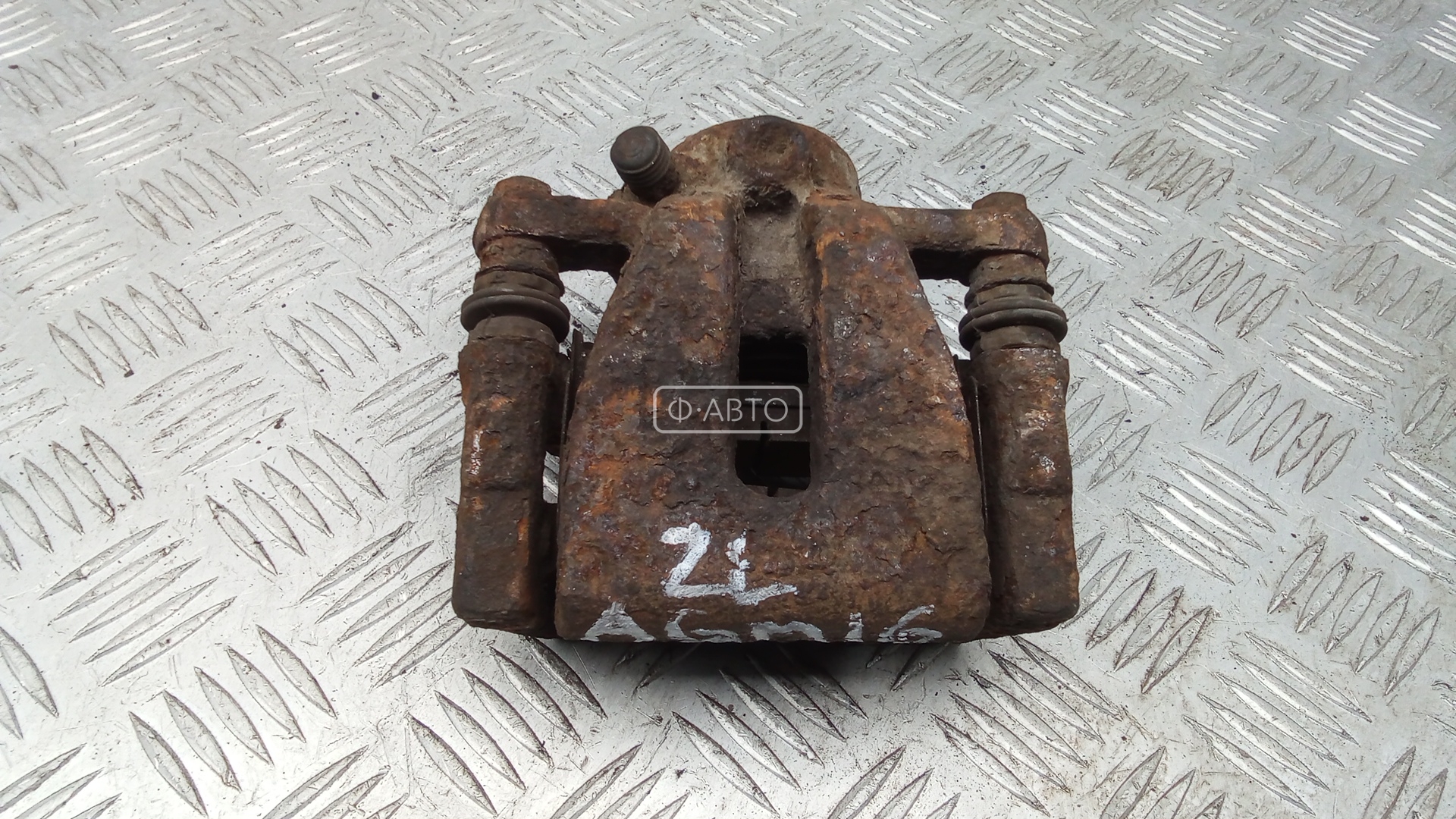 Суппорт тормозной задний левый