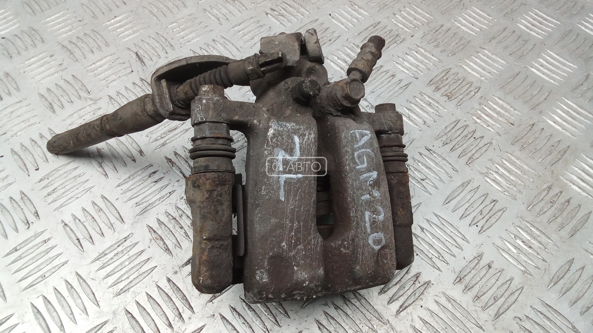 Суппорт тормозной задний левый