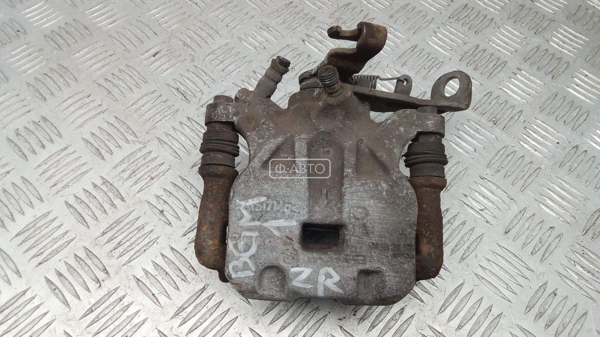 Суппорт тормозной задний правый