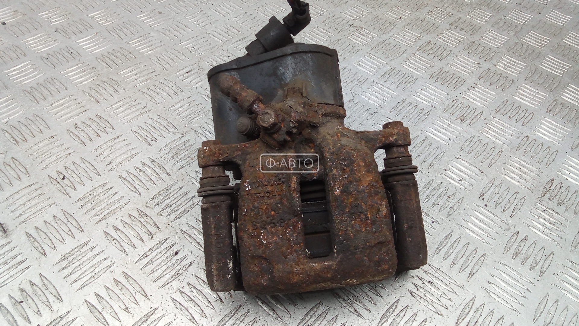 Суппорт тормозной задний правый