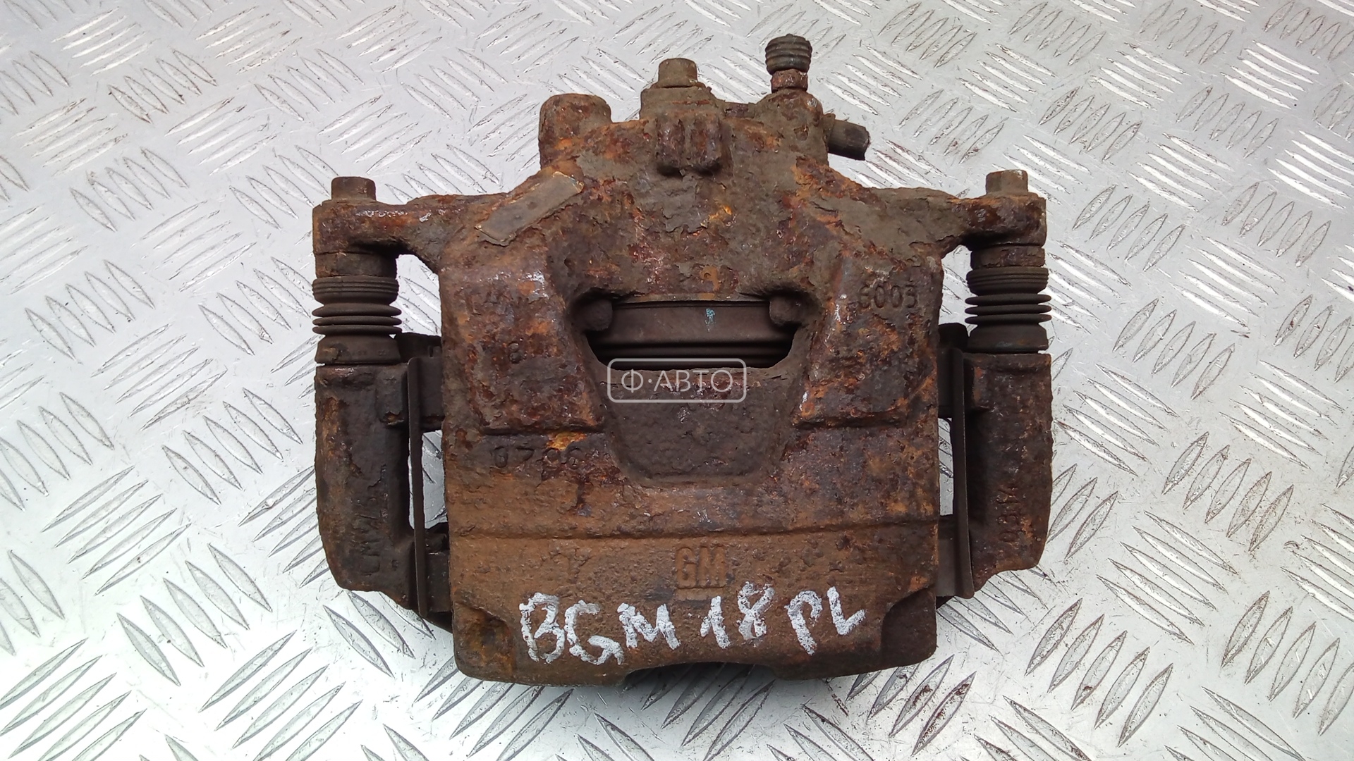 Суппорт тормозной передний левый