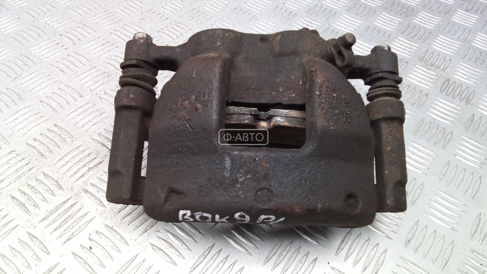 Суппорт тормозной передний левый