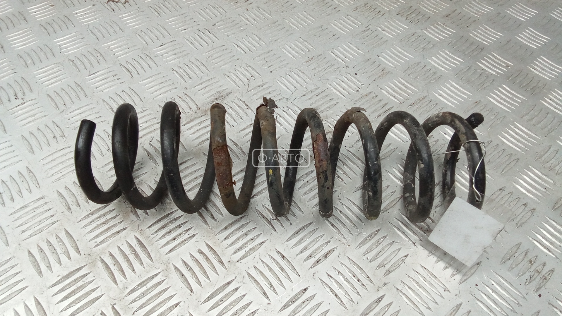 Пружина задняя