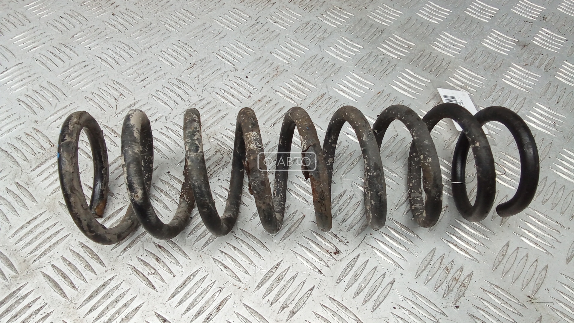 Пружина задняя