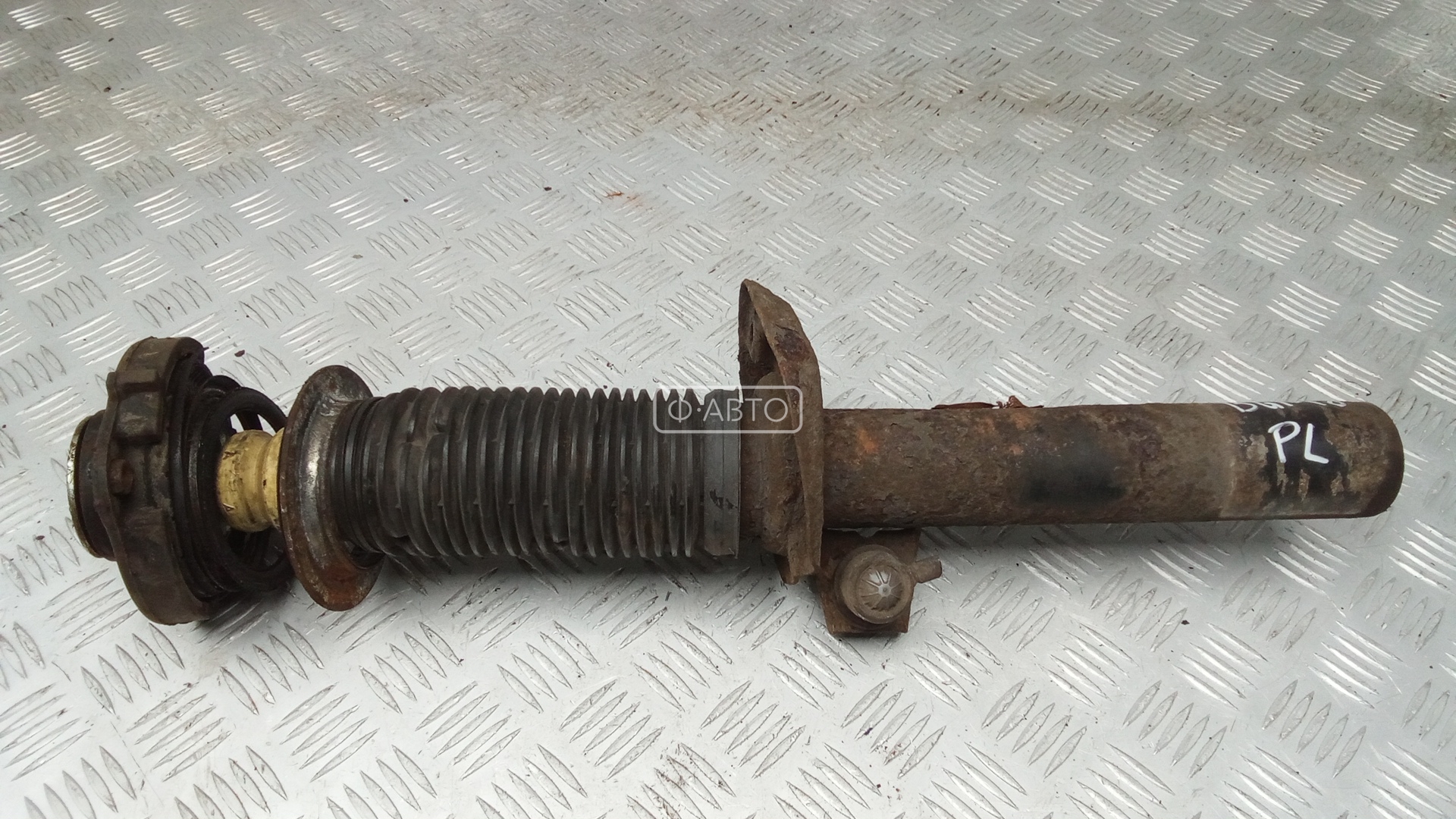 Амортизатор передний левый