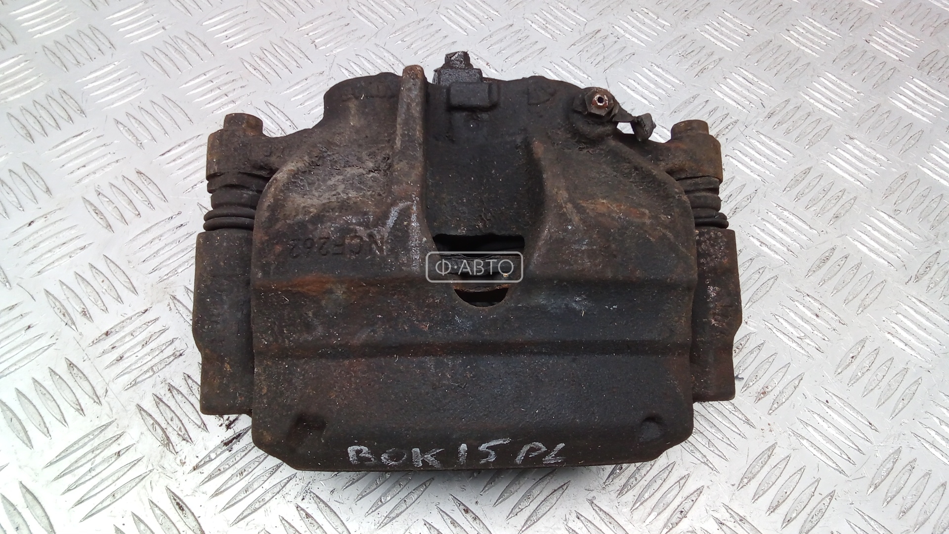 Суппорт тормозной передний левый