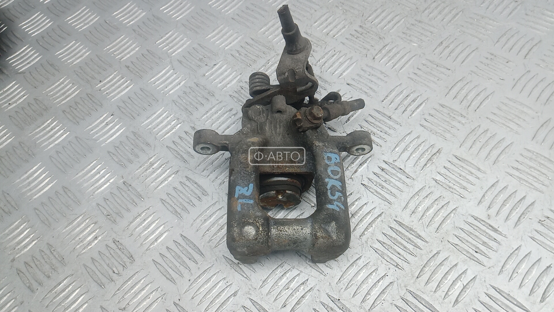 Суппорт тормозной задний левый