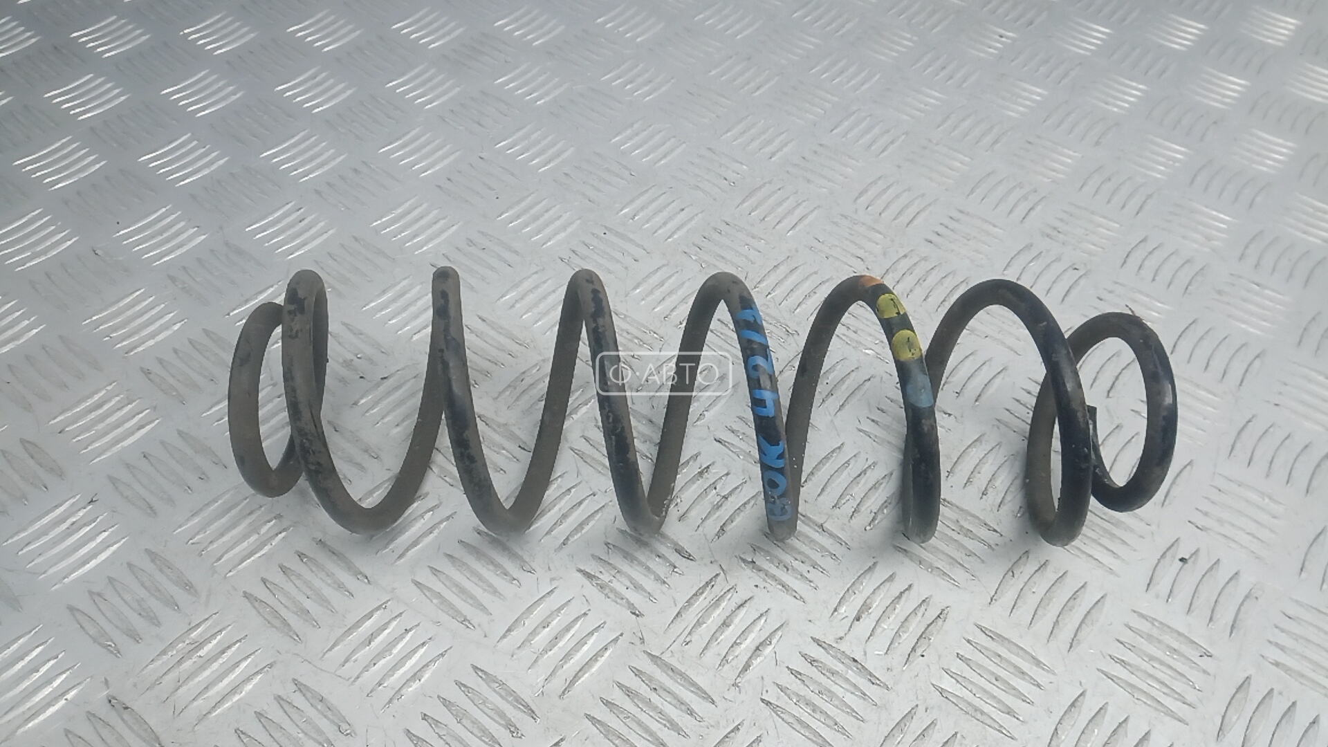 Пружина задняя