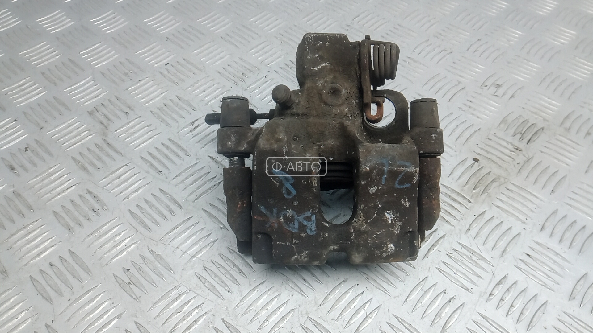 Суппорт тормозной задний левый