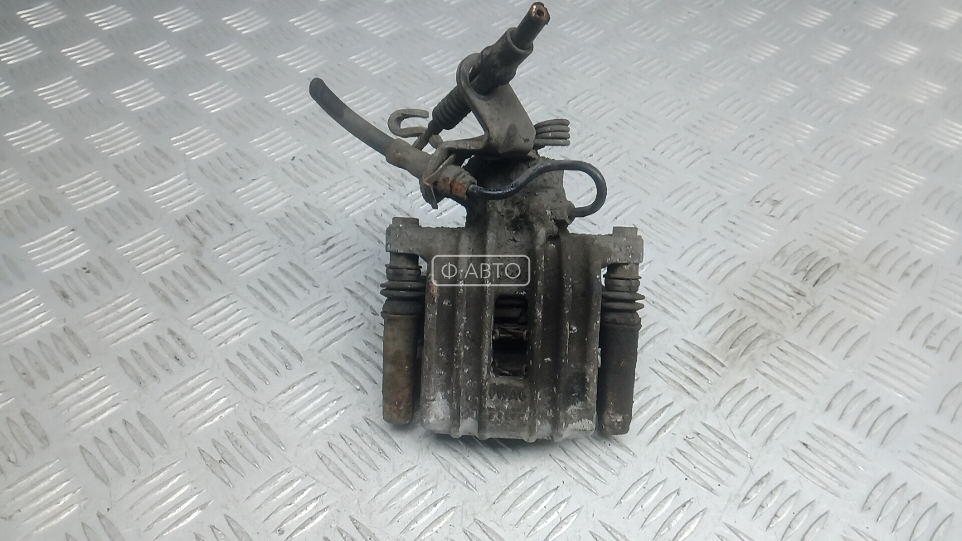 Суппорт тормозной задний правый