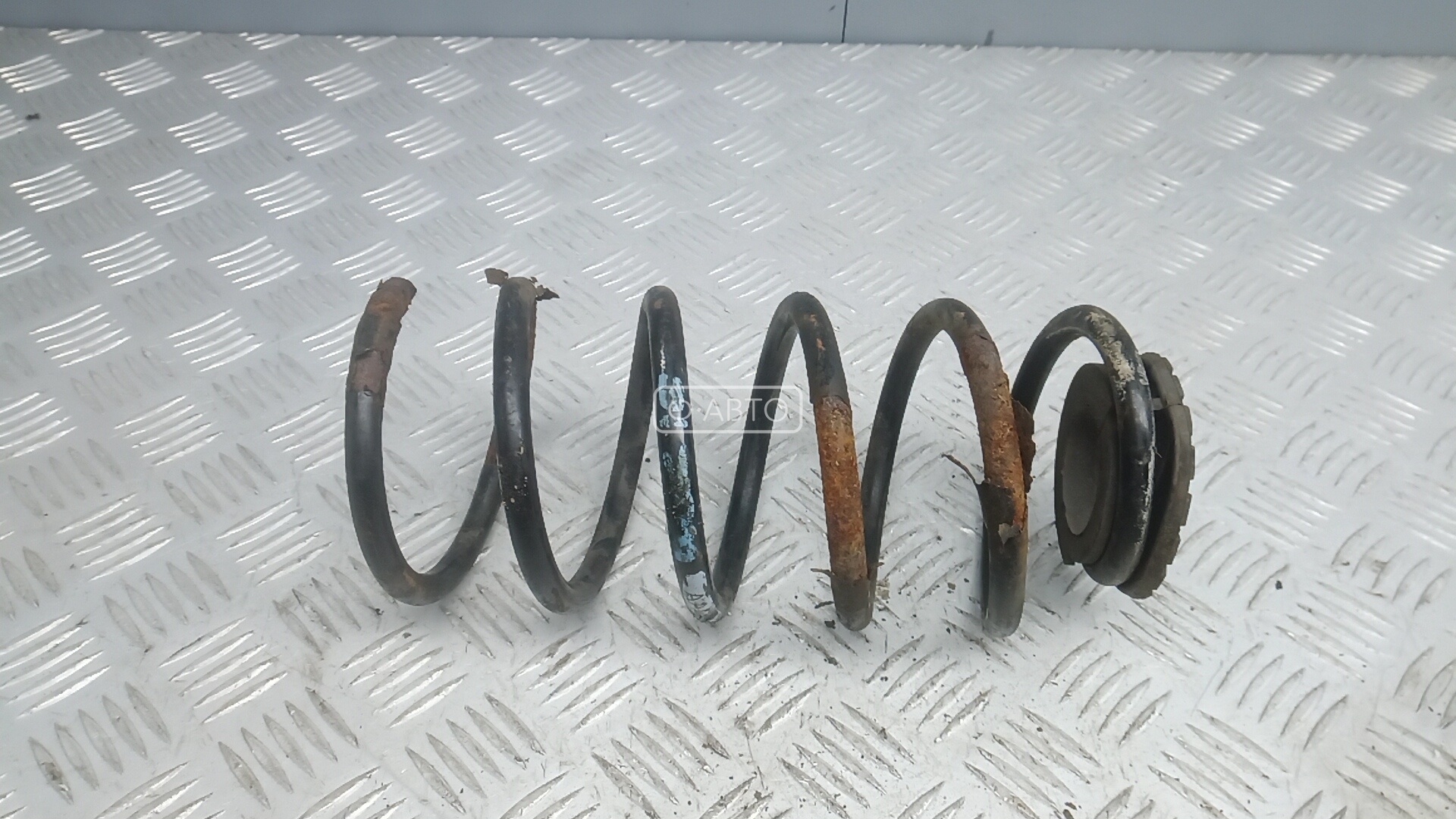 Пружина задняя