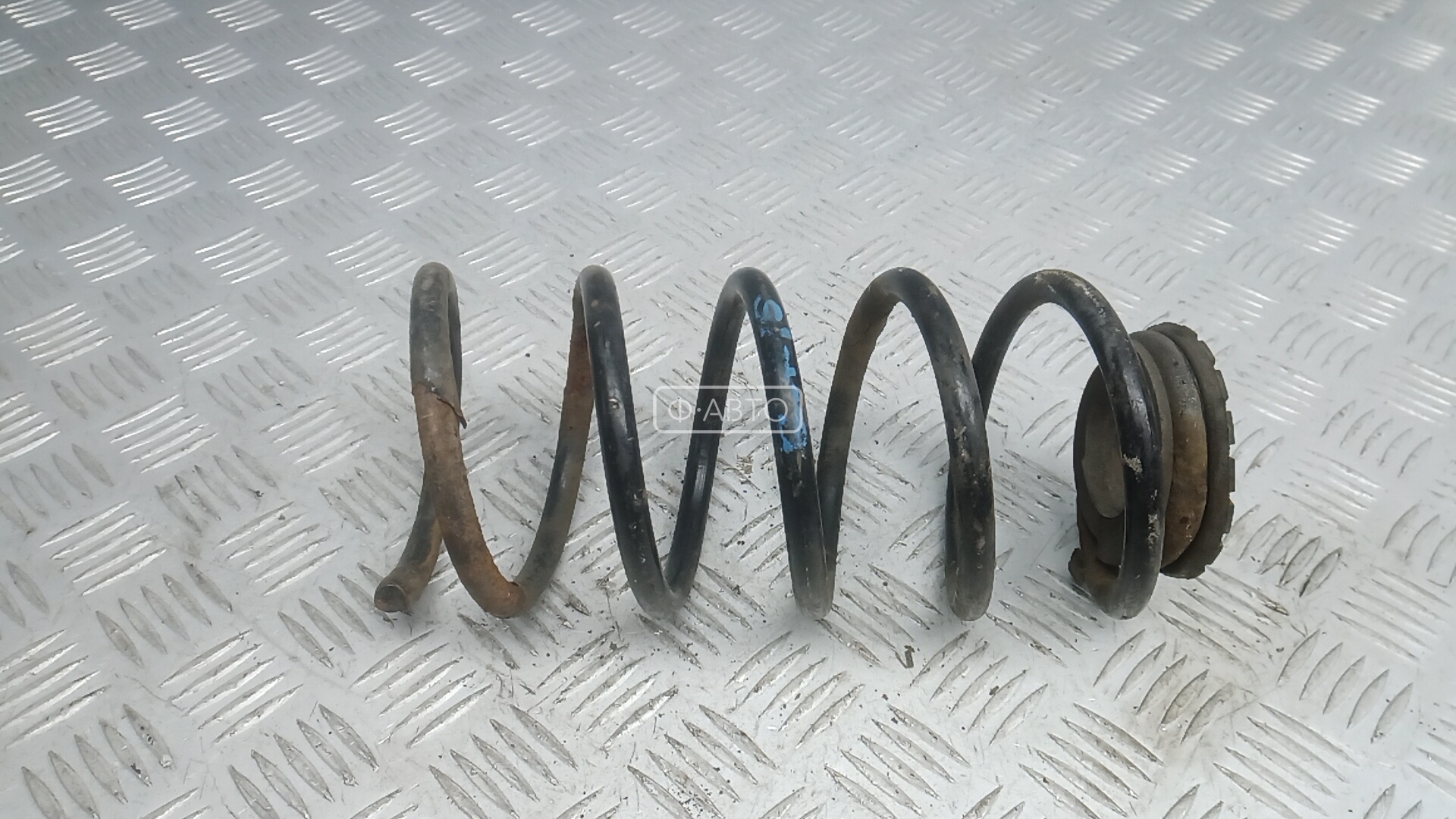 Пружина задняя