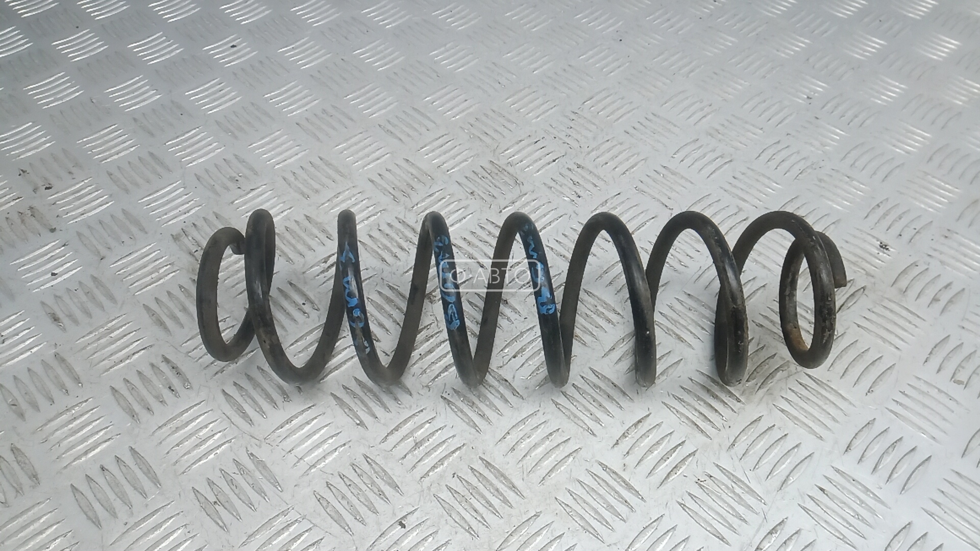 Пружина задняя