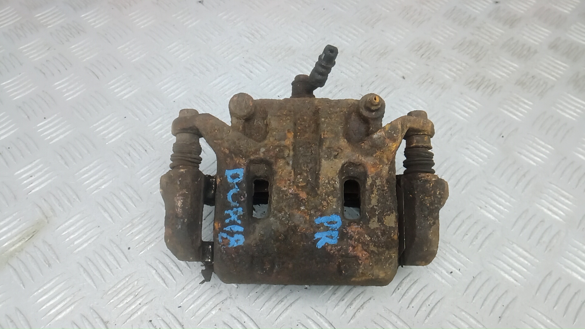 Суппорт тормозной передний правый NISSAN PATHFINDER R51