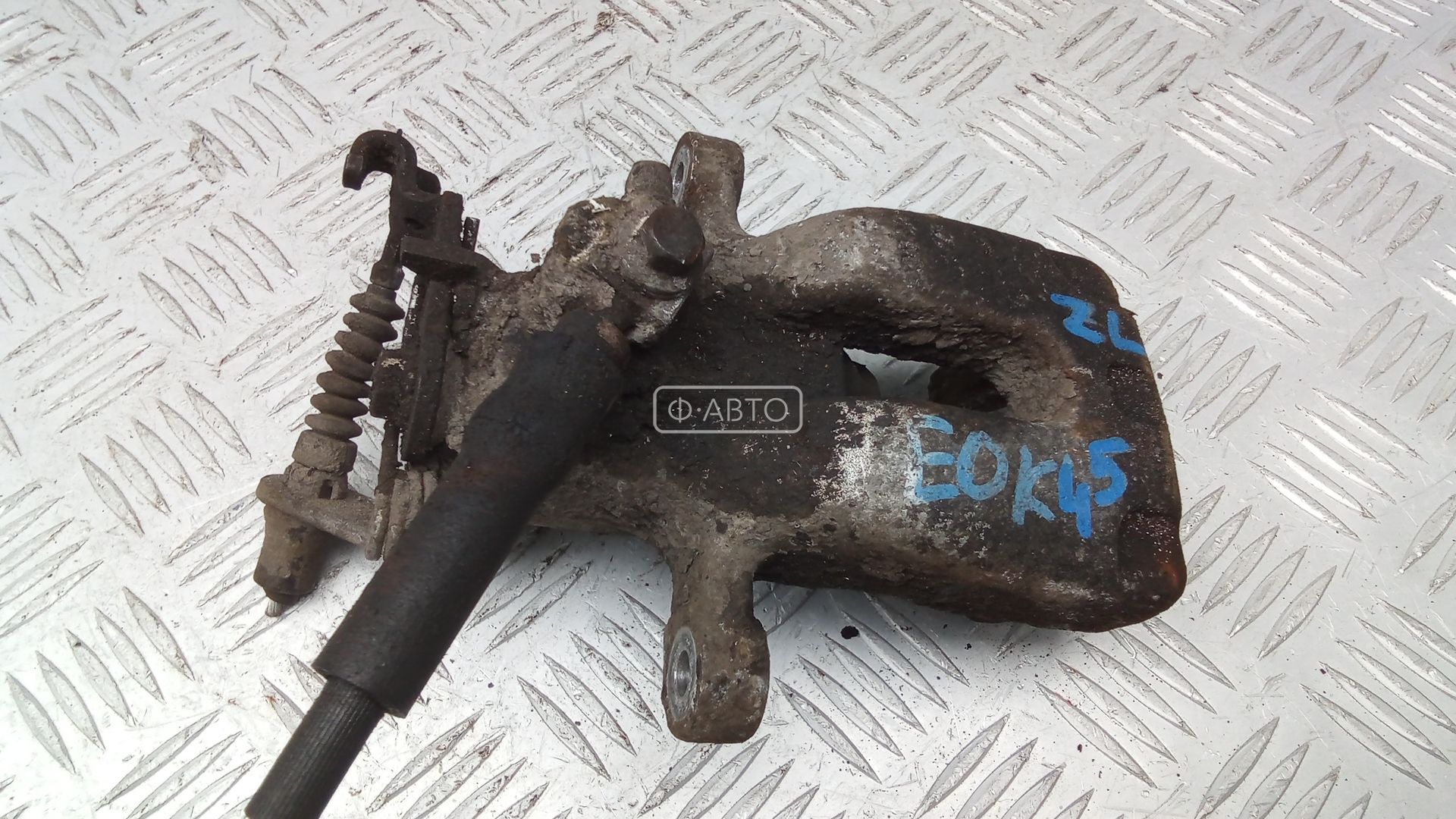 Суппорт тормозной задний левый