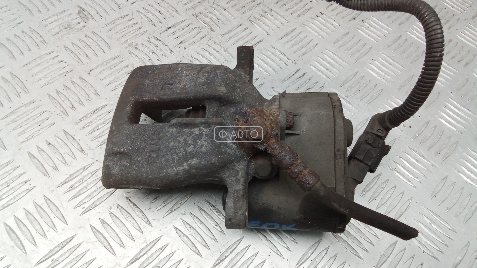 Суппорт тормозной задний левый